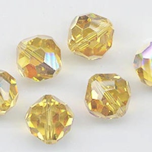 Twelve pieces vintage Swarovski crystals - Art. 39/5300 - 10mm - light topaz AB