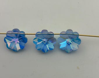 Six rare vintage Swarovski “daisies” - Art. 5110 - light sapphire AB - 16mm