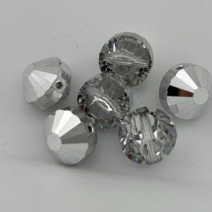 8 vintage Swarovski crystal beads -- rare style art. 349/5101 - 10mm - crystal comet argent light