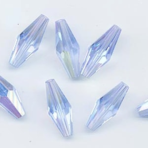 Twelve vintage Swarovski crystal beads - Art. 5205 - 17.5x7mm - light sapphire AB