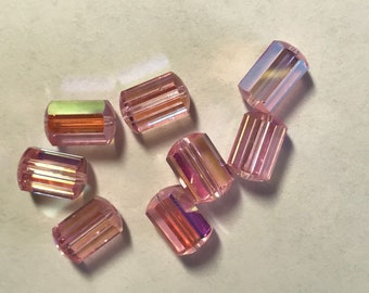 Twelve vintage Swarovski crystal beads: Art. 5230 - light rose AB - 9x6mm