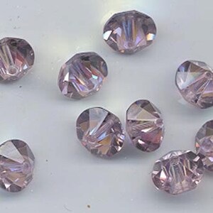 Twelve rare vintage Swarovski crystal beads: Art. 42/5307 - 10mm - light amethyst AB