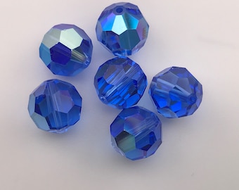 Twelve  non-standard Swarovski crystals - Art. 5000 - 10 mm - sapphire AB