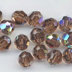 Zwölf vintage Swarovski Kristalle - Art. 5000 - 8 mm - Reprise der eingestellten Farbe Colorado Topaz AB