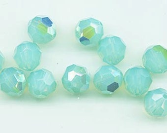 Twelve Swarovski crystals: art 5000 - 8 mm - pacific opal AB