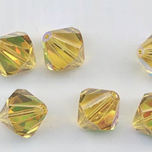 Eight super-rare vintage Swarovski crystal beads: Art. 364/5301 - 12mm - light topaz AB