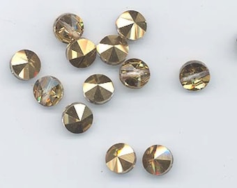 Twelve amazingly rare vintage Swarovski crystal beads: Art. 5102/20 - 8 mm - crystal comet OR - shiny gold