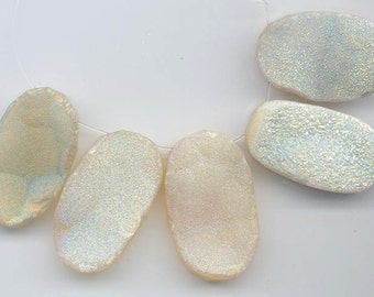 Five druzy/drusy chalcedony pendants with shimmering sparkle