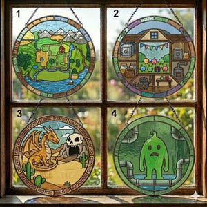 May include: Four round stained glass window hangings. Each features a unique design: a landscape, a shop interior, a dragon with a skull, and a green creature. Each is framed with a decorative border and suspended by a chain.