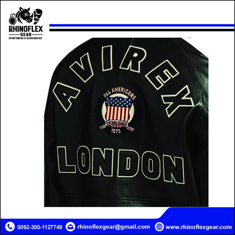 May include: A black leather jacket featuring the word AVIREX arched in white lettering at the top and the word LONDON in white lettering at the bottom. A circular patch in the centre displays the text ALL AMERICANS ESTABLISHED 1975.