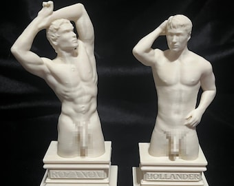 May include: Two off-white statues of male torsos on rectangular pedestals. The left statue is labeled ROZANOV and depicts a figure with arms raised above the head. The right statue is labeled HOLLANDER and depicts a figure with one hand on the head.