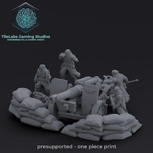 May include: A gray miniature artillery scene with several figures, a cannon, and sandbags. The figures are in winter gear, and the cannon has a shield with an emblem. The text "TileLabs Gaming Studios" and "presupported - one piece print" are visible.