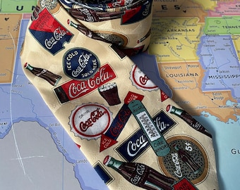 vintage coca cola necktie, coke tie, coca cola memorabilia, vintage signs, pop bottles, soda bottles, thermometer, collectors tie