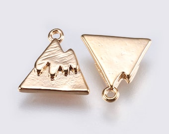May include: Two gold-tone metal triangle charms. One charm features a mountain design, while the other is a simple triangle.