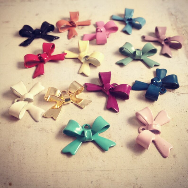 Miniature Acrylic Fuchsia Bow Embellishments Pack of 20 bows