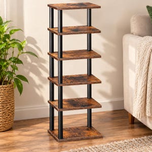 May include: A tall, narrow shelving unit featuring six rectangular shelves with a dark brown wood grain finish. The shelves are supported by four vertical black metal poles, creating an open, tiered structure for storage and display.
