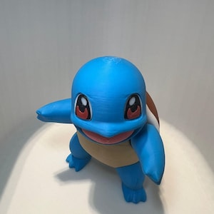 Squirtle figurine, the Water-type Pokémon, featuring a layered surface finish typical of 3D printing.