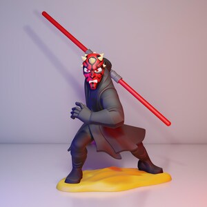May include: A figurine of Darth Maul, a Star Wars character, in a dynamic pose. The figure is predominantly black and red, with a red double-bladed lightsaber. The base is yellow, and the background is a gradient of purple and white.