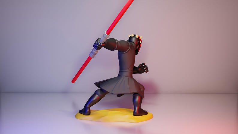 May include: A black and gray action figure of a character with a red lightsaber. The figure is in a dynamic pose, with a black outfit and a red and black helmet. It stands on a yellow base.