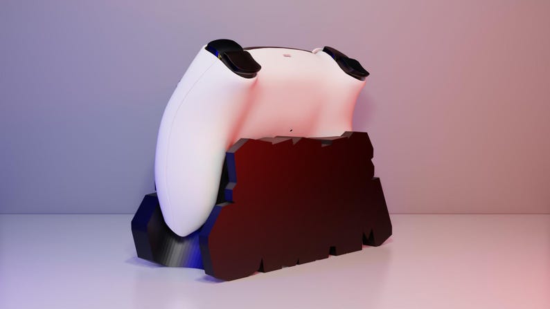 May include: A white gaming controller rests on a black and red stand. The controller has black accents and is positioned on a stand with a jagged, geometric design. The background has a gradient of purple and red.