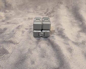 Fidget Cube: Juguete antiestrés de plástico gris