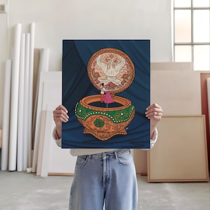 Large art print being held by artist in an art studio featuring Anastasia music box art with elegant floral accents.