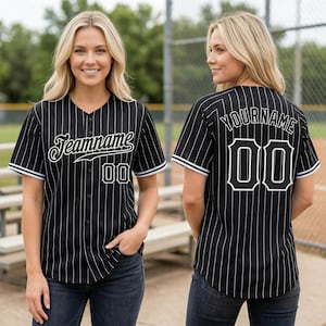 May include: Black baseball jersey with white pinstripes, featuring the text "Teamname" and the number "00" on the front. The back of the jersey displays "YOURNAME" and the number "00". The jersey has white trim on the sleeves and collar.