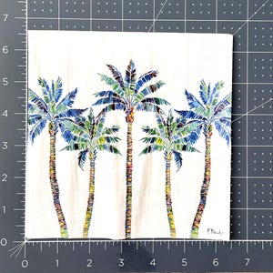 Paper Napkin featuring Blue and green mosaic patten palm leaves with multicolored palm tree trunk