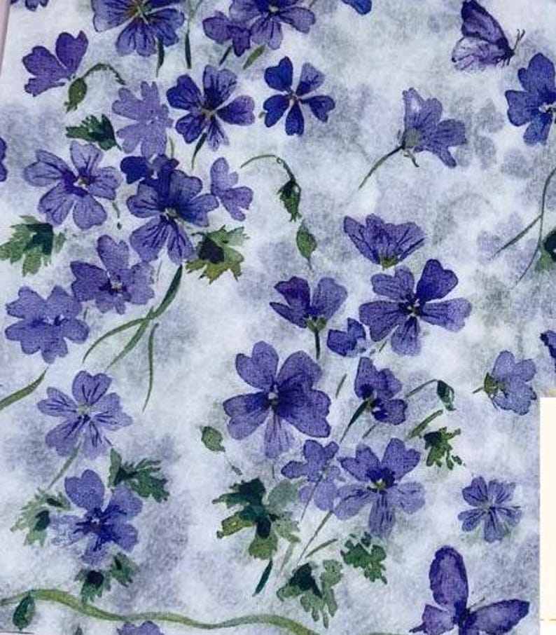 Paper Napkin featuring Cobalt blue vinca blooms with green stems on white background