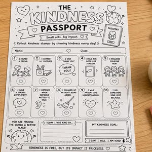 May include: A white paper sheet titled The Kindness Passport with black line art illustrations and text. It features ten numbered boxes for tracking acts of kindness, a name and class field, and motivational phrases like Small acts. Big impact.
