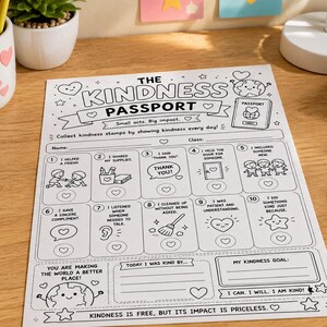 May include: A white paper sheet titled The Kindness Passport with black line art illustrations and text. It features ten numbered boxes for tracking acts of kindness, a section for a name and class, and motivational phrases like I can. I will. I am kind.