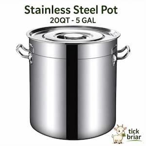 May include: A stainless steel pot with a lid and two handles. The pot is labeled "Stainless Steel Pot 20QT - 5 GAL". The pot is silver and has a shiny finish. The pot is designed for cooking and food preparation.