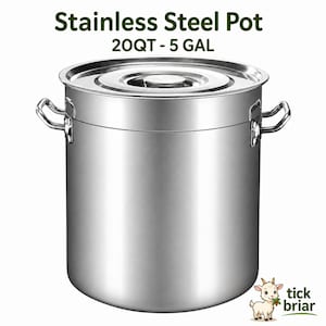 May include: A silver stainless steel pot with a lid and two side handles. The text Stainless Steel Pot 20QT - 5 GAL is printed above the pot. A small cartoon goat logo with the text tick briar is located in the bottom right corner.