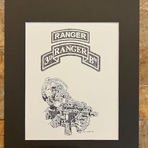May include: Black and white illustration of a soldier holding a rifle, framed in black. The artwork includes the text "RANGER" above and "3D RANGER BN" below. Signed "T. CASEY '16".