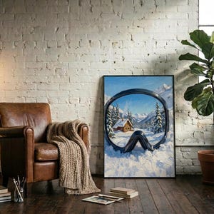 Könnte beinhalten: Ein gerahmter, rechteckiger Kunstdruck für die Wand, der eine Nahaufnahme einer schwarzen Skibrille zeigt. Das Glas spiegelt eine verschneite Berglandschaft mit einer Holzhütte und Tannen wider. Das Bild steht in einem Raum mit einem Ledersessel.