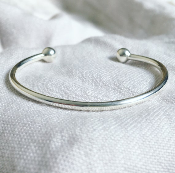 Baby boy deals christening bangle