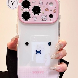 May include: A set of three ceramic nesting bowls in shades of blue, green, and white. The bowls feature a speckled glaze and a simple, modern design. The largest bowl measures approximately 6 inches in diameter.