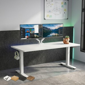 May include: A white standing desk with two computer monitors mounted on a dual arm, a small fox-shaped planter, and a pair of headphones hanging on the side. Four small square color swatches are displayed in the bottom left corner of the frame.