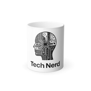 May include: White ceramic mug with a black graphic of a circuit board in the shape of a human head. The text "Tech Nerd" is printed in black below the graphic. A fun gift for tech enthusiasts.