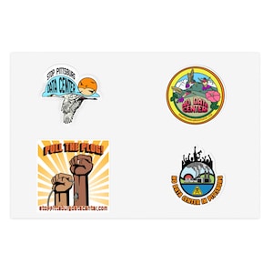May include: Four stickers featuring protest themes. Top left: a crane flying with text STOP PITTSBURG DATA CENTER. Top right: hummingbirds and flowers with NO DATA CENTER. Bottom left: two raised fists holding a plug with PULL THE PLUG. Bottom right: industrial buildings with NO DATA CENTER IN PITTSBURG.