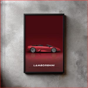 May include: A framed print of a red Lamborghini Murcielago LP 640 convertible. The car is displayed against a deep red backdrop, with the Lamborghini logo and model name at the bottom. The print is in a black frame.
