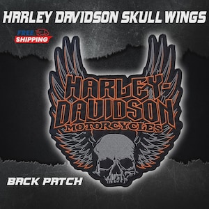 May include: Black back patch with the words "HARLEY DAVIDSON SKULL WINGS" in white. The patch features a skull with wings and the words "HARLEY-DAVIDSON MOTORCYCLES" in orange and black.