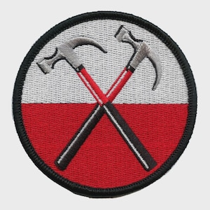May include: Embroidered patch featuring two crossed silver claw hammers with red handles and black shafts, set against a white and red background. The patch is circular with a black border.