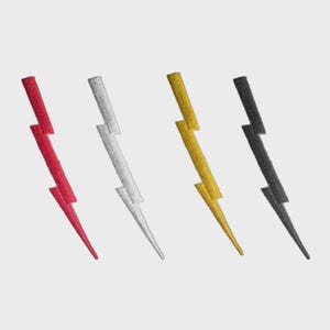 May include: Four embroidered lightning bolt patches in red, silver, gold, and black. Each bolt is angled diagonally, showcasing the detailed stitching and vibrant colors. These patches are ideal for adding a unique touch to clothing or accessories.