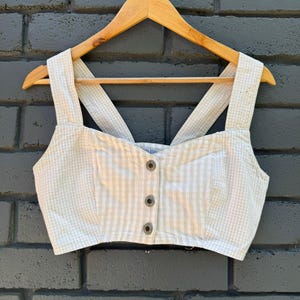 May include: A set of three ceramic mugs with a speckled, matte finish. The mugs are in shades of cream, light gray, and dark gray. Each mug has a simple, minimalist design, perfect for coffee or tea.