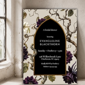 May include: A rectangular invitation card featuring a beige background with dark purple flowers and twisted brown branches. A central black arch with a gold border contains white text: A bridal shower honoring EVANGLELINE BLACKTHORN, Saturday, October 17, 5 pm, 128 Willowbrook Lane, Charleston, SC 29403, Kindly RSVP by October 7, Madison 555-444-3333.