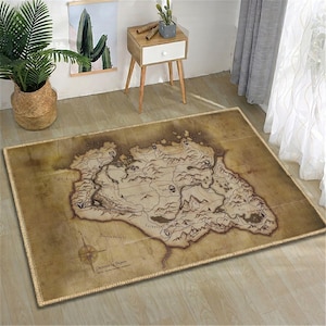 May include: A rectangular rug featuring a detailed map design in shades of brown and tan, with a compass rose in the lower left corner. The rug has a beige border and is placed on a light-colored wooden floor.