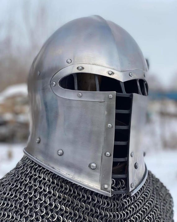 15th-century Italian barbute (or barbuta), which traditionally featured a T- or Y-shaped opening for the face.