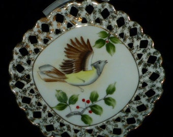 Vintage UCAGCO Bird Plate: Hand-Painted Ceramic with Gilt Lattice Border