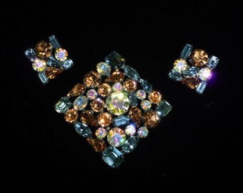 Early WEISS Brooch and Clip Earrings Set, White A.B., Golden Topaz & Steel Blue Austrian Crystals, Japanned Finish, All Signed